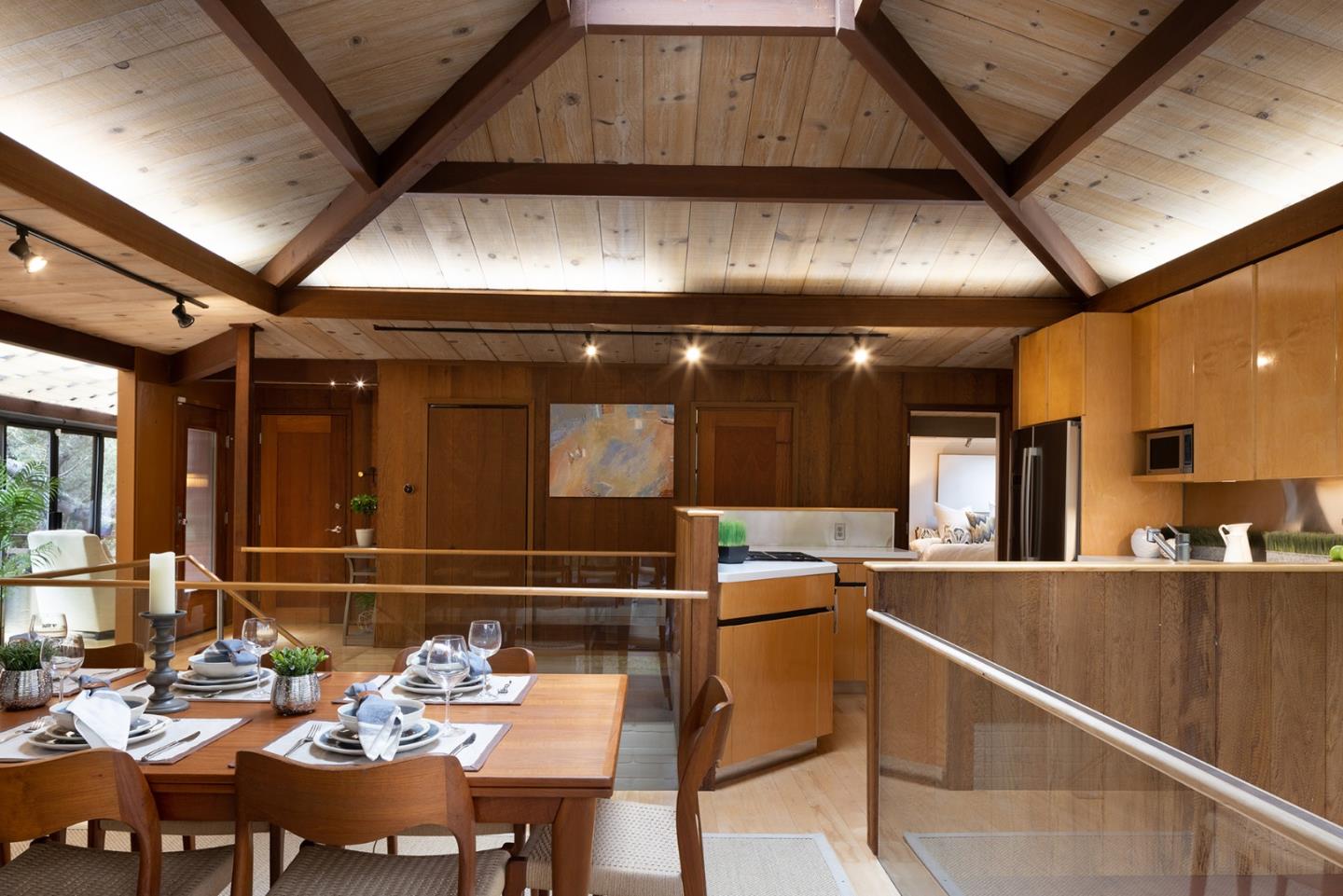 4145 Segunda Drive Carmel, CA 93923 - Photo 7 of 30 a kitchen with a table chairs stove and cabinets
