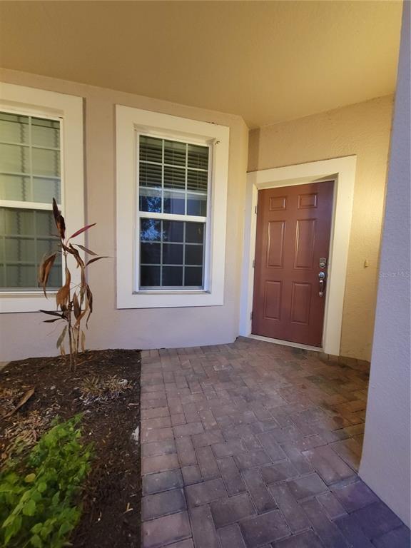 8335 Bella Vida Circle, Unit 8335 Davenport, FL 33896 - Photo 16 of 16 an empty room with a window