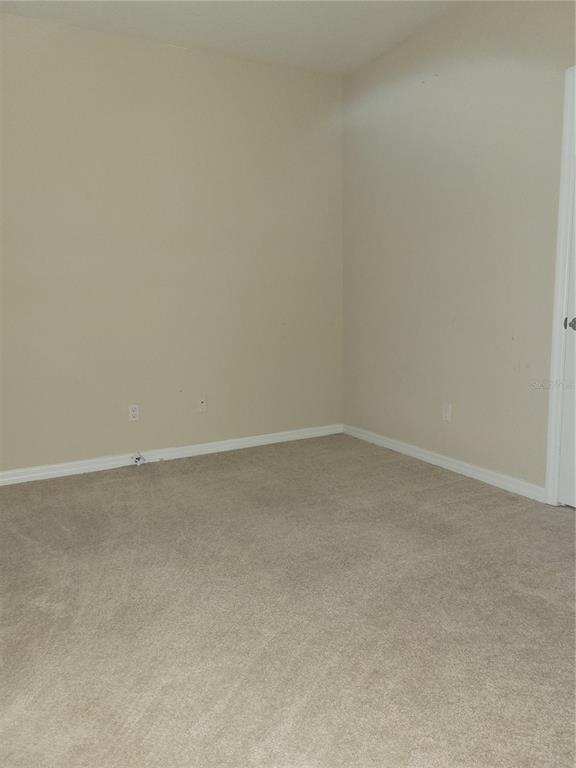 8335 Bella Vida Circle, Unit 8335 Davenport, FL 33896 - Photo 9 of 16 a view of an empty room