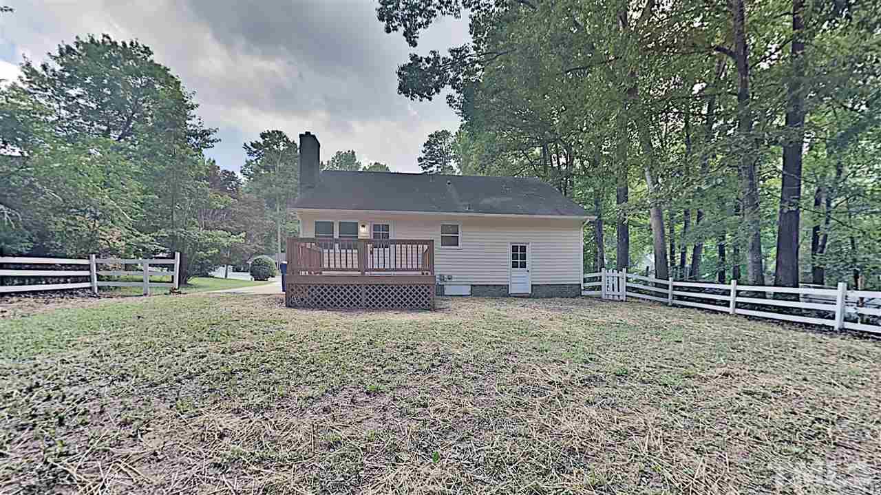 7209 Stuart Drive Raleigh, NC 27615 - Photo 11 of 13 a house view with a garden space