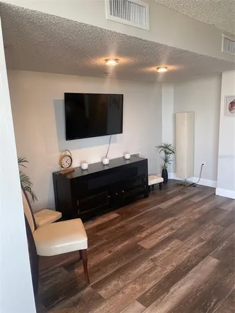 a bathroom with a double vanity sink and mirror
