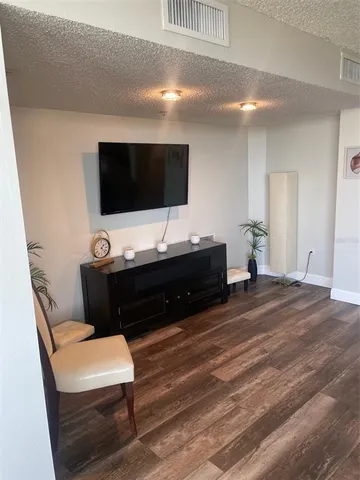 a bathroom with a double vanity sink and mirror