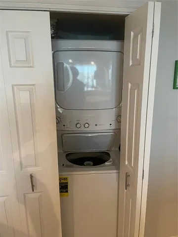 a view of a kitchen with a sink and a stove