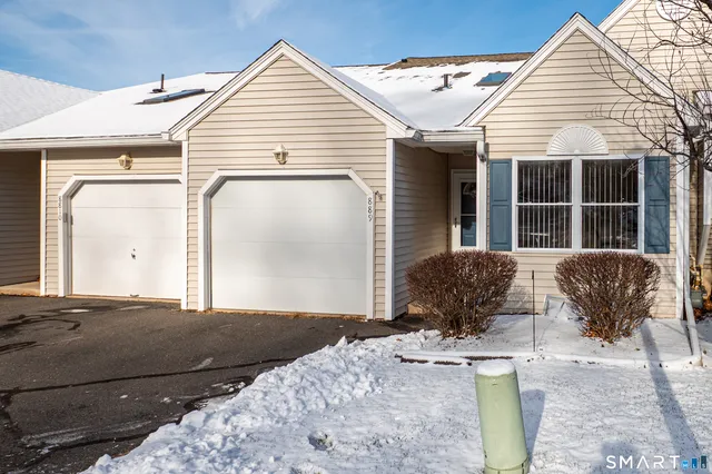 a view of a house with large windows