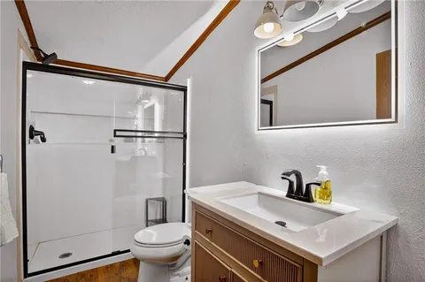 a bathroom with a sink and a toilet