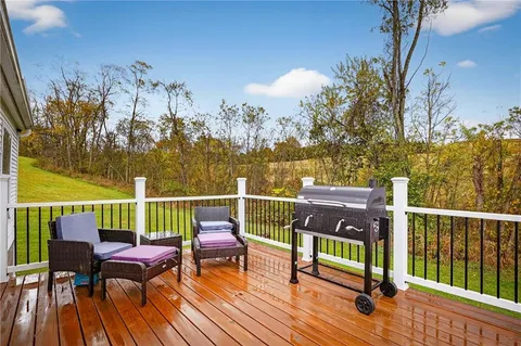 a view of a chairs on the deck