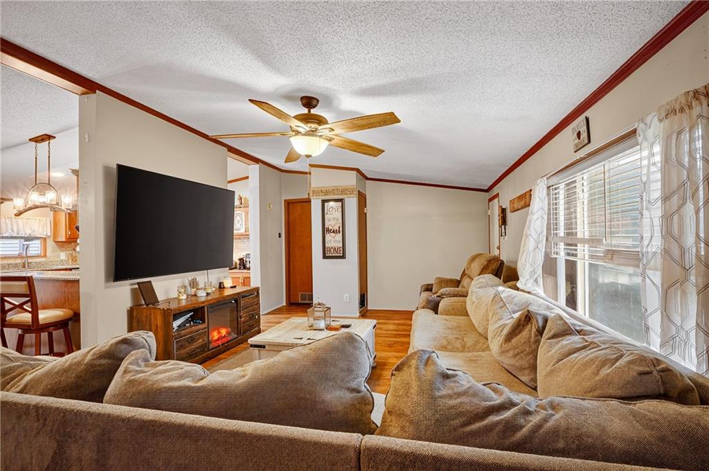 90 Hornhead Road McDonald, PA 15057 - Photo 4 of 33 a living room with furniture and a flat screen tv