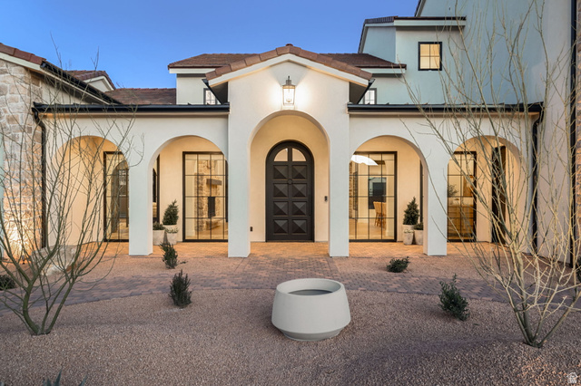 4871 South Homestead Way Washington, UT 84780 - Photo 10 of 151 Rear view of property with stucco siding and a porch