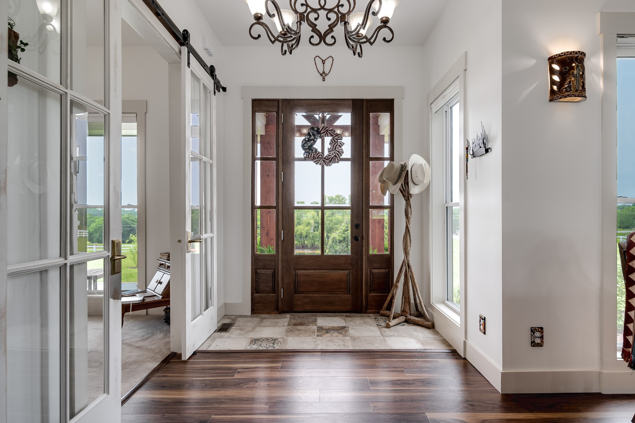 7040 Highway 231 Bethpage, TN 37022 - Photo 12 of 83 a view of a hallway with wooden floor and stairs