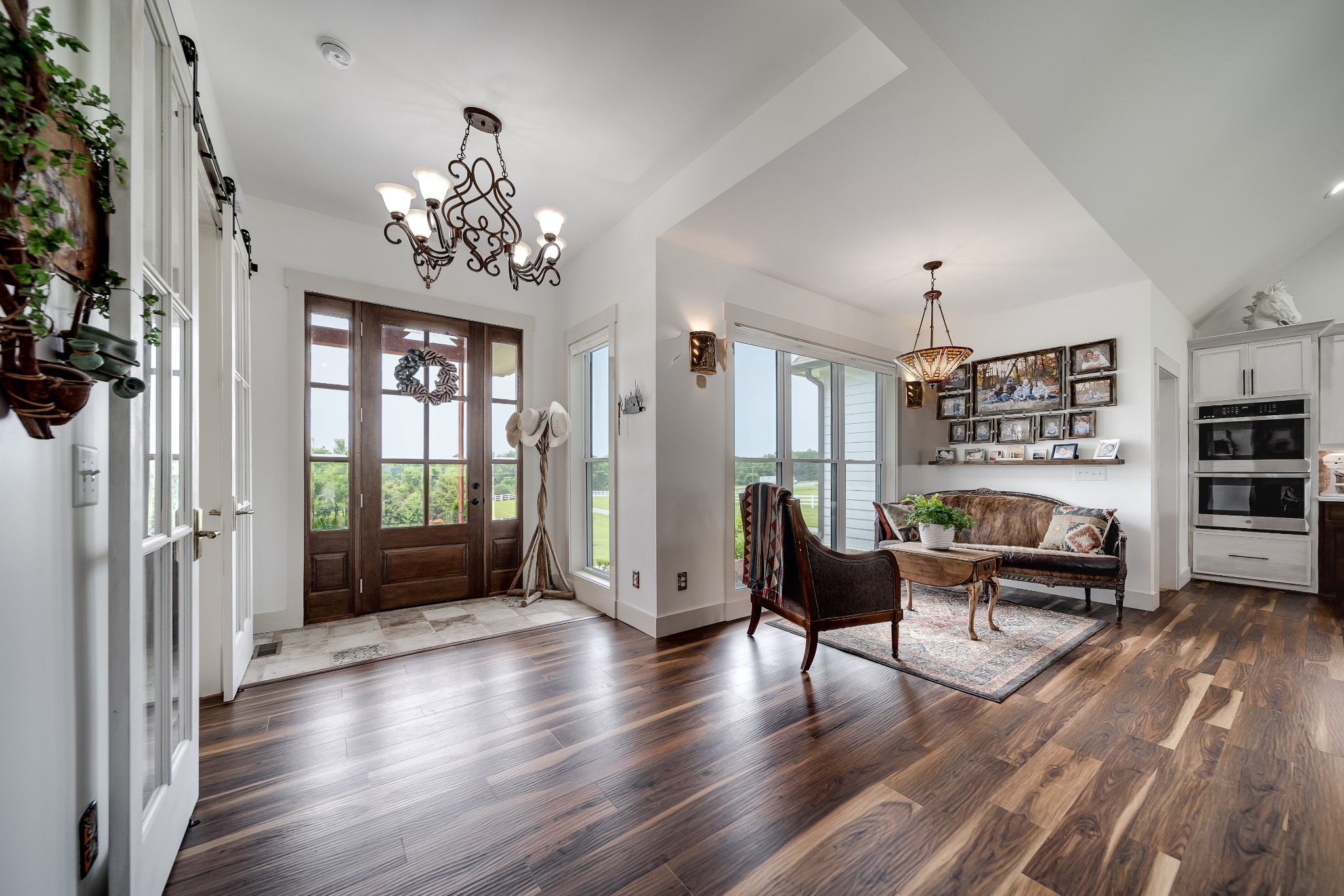 7040 Highway 231 Bethpage, TN 37022 - Photo 13 of 83 a living room with furniture or chandelier and a wooden floor