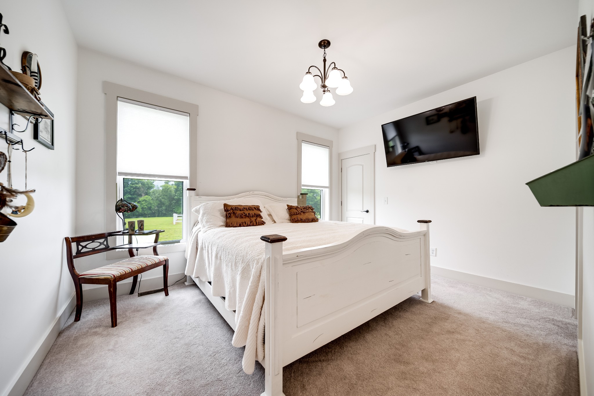 7040 Highway 231 Bethpage, TN 37022 - Photo 18 of 83 a bed room with a bed and a flat screen tv