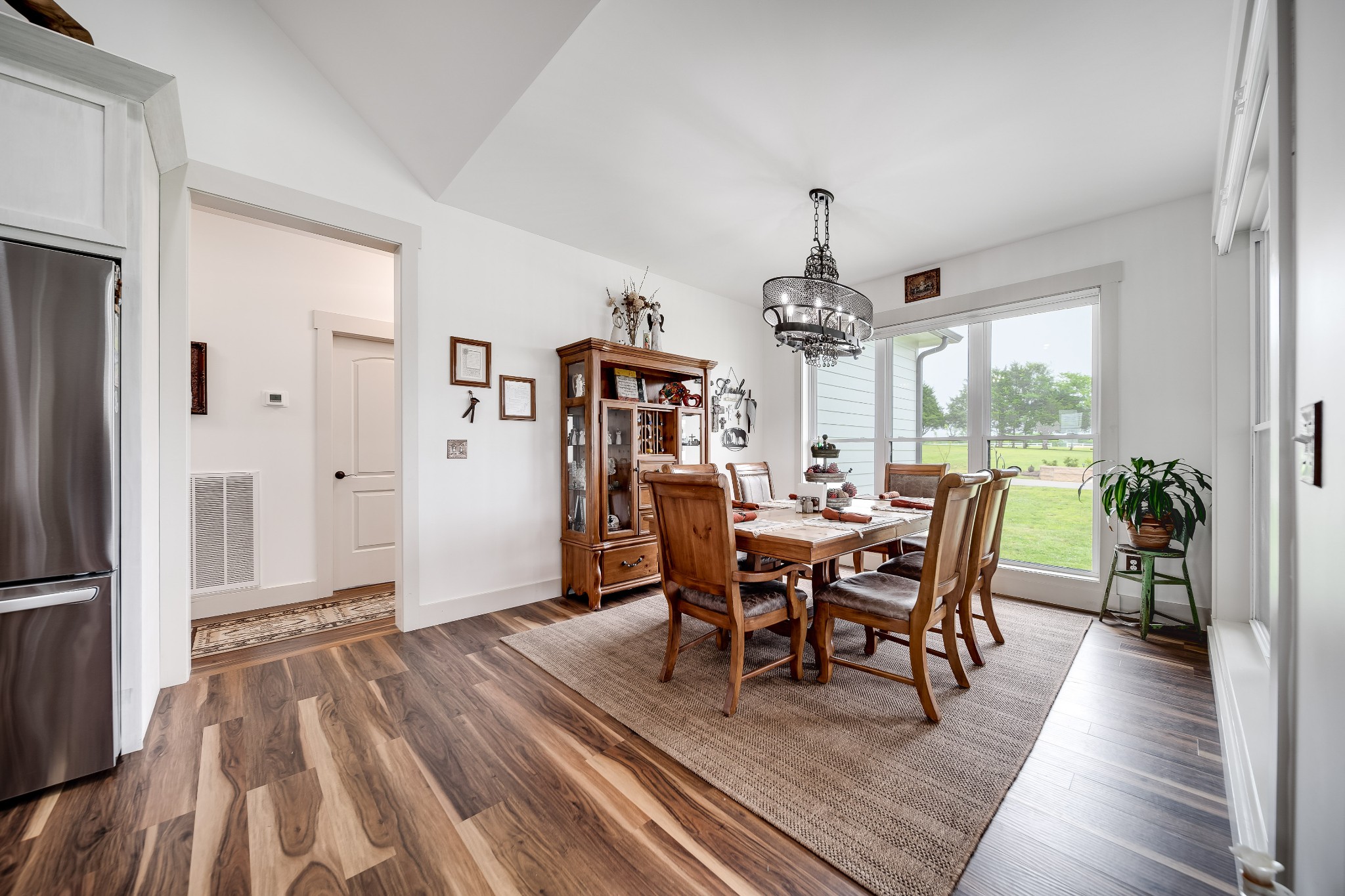 7040 Highway 231 Bethpage, TN 37022 - Photo 36 of 83 a view of a dining room with furniture window and wooden floor