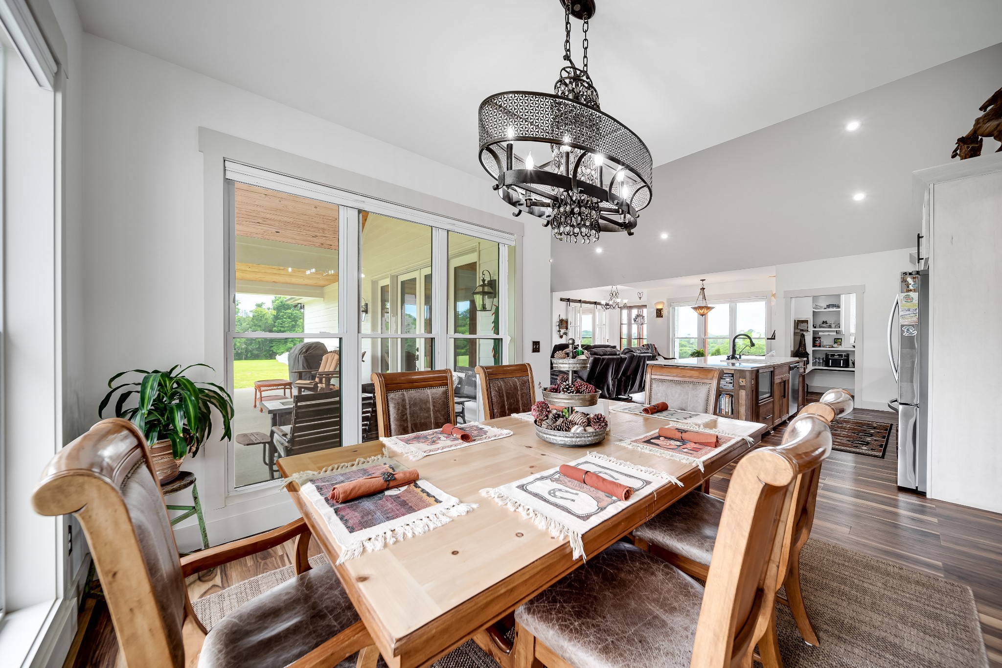7040 Highway 231 Bethpage, TN 37022 - Photo 37 of 83 a view of a dining room with furniture wooden floor and chandelier