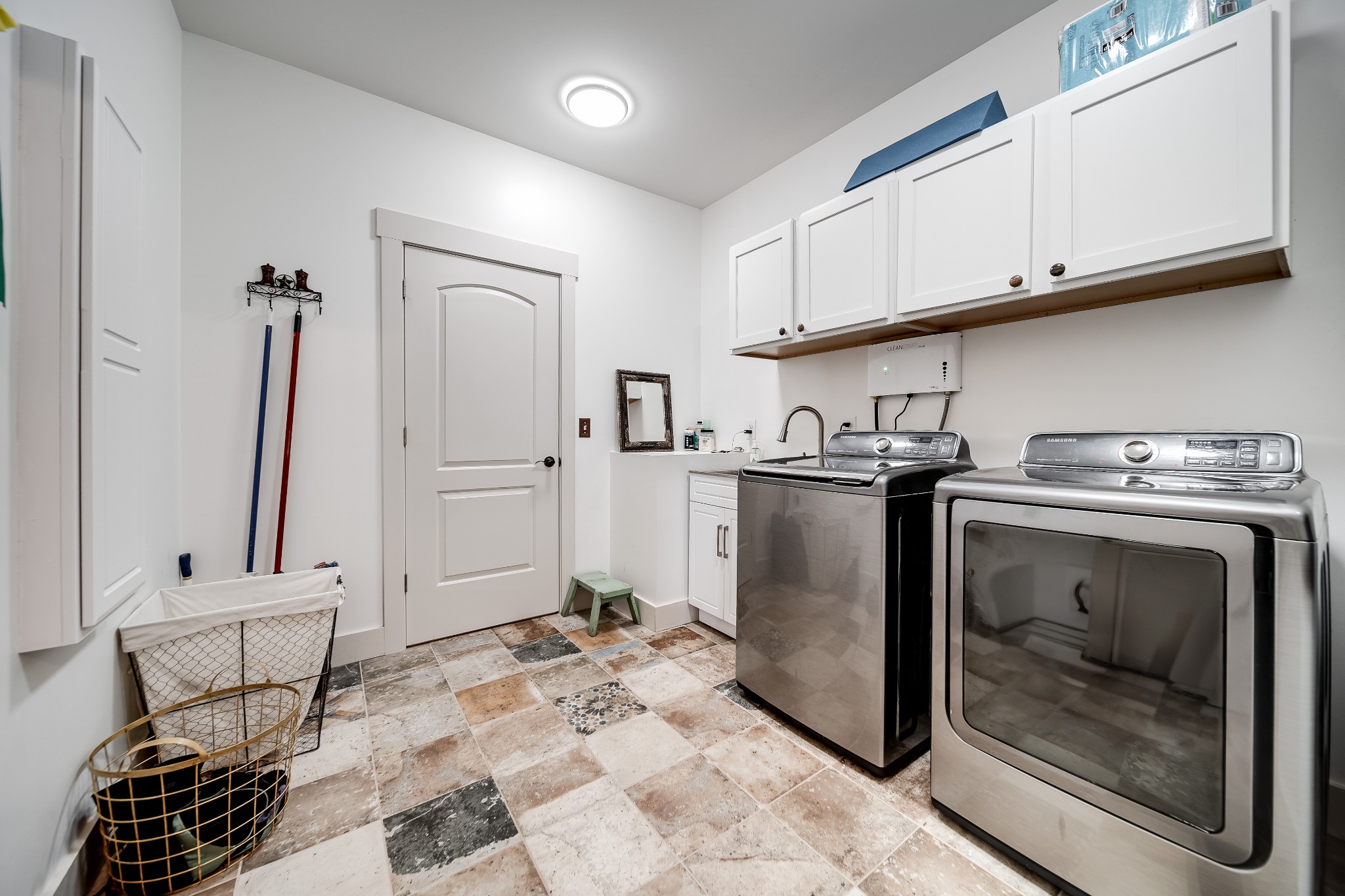 7040 Highway 231 Bethpage, TN 37022 - Photo 47 of 83 a kitchen with stainless steel appliances granite countertop a refrigerator a stove and white cabinets