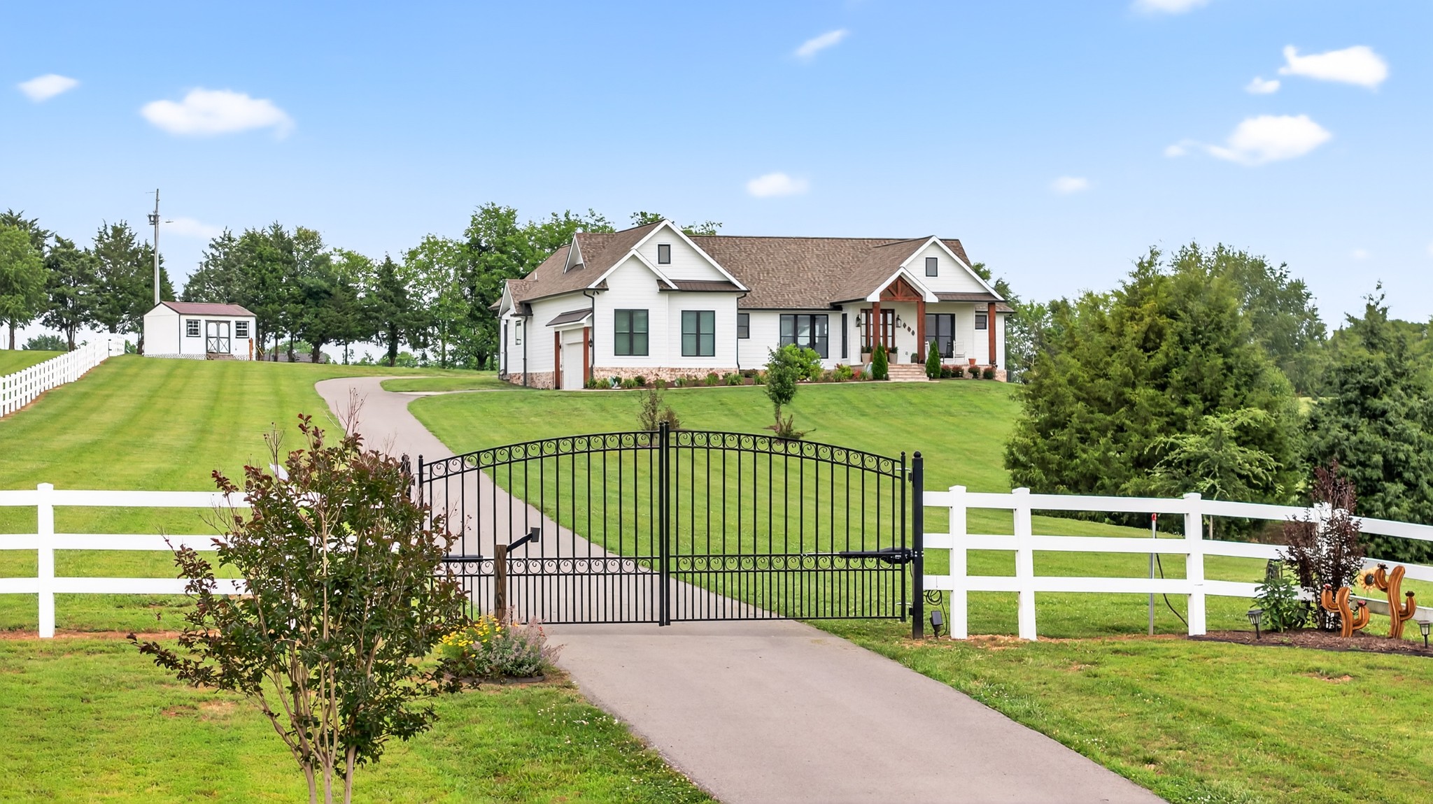 7040 Highway 231 Bethpage, TN 37022 - Photo 5 of 83 a view of a house with a yard and plants