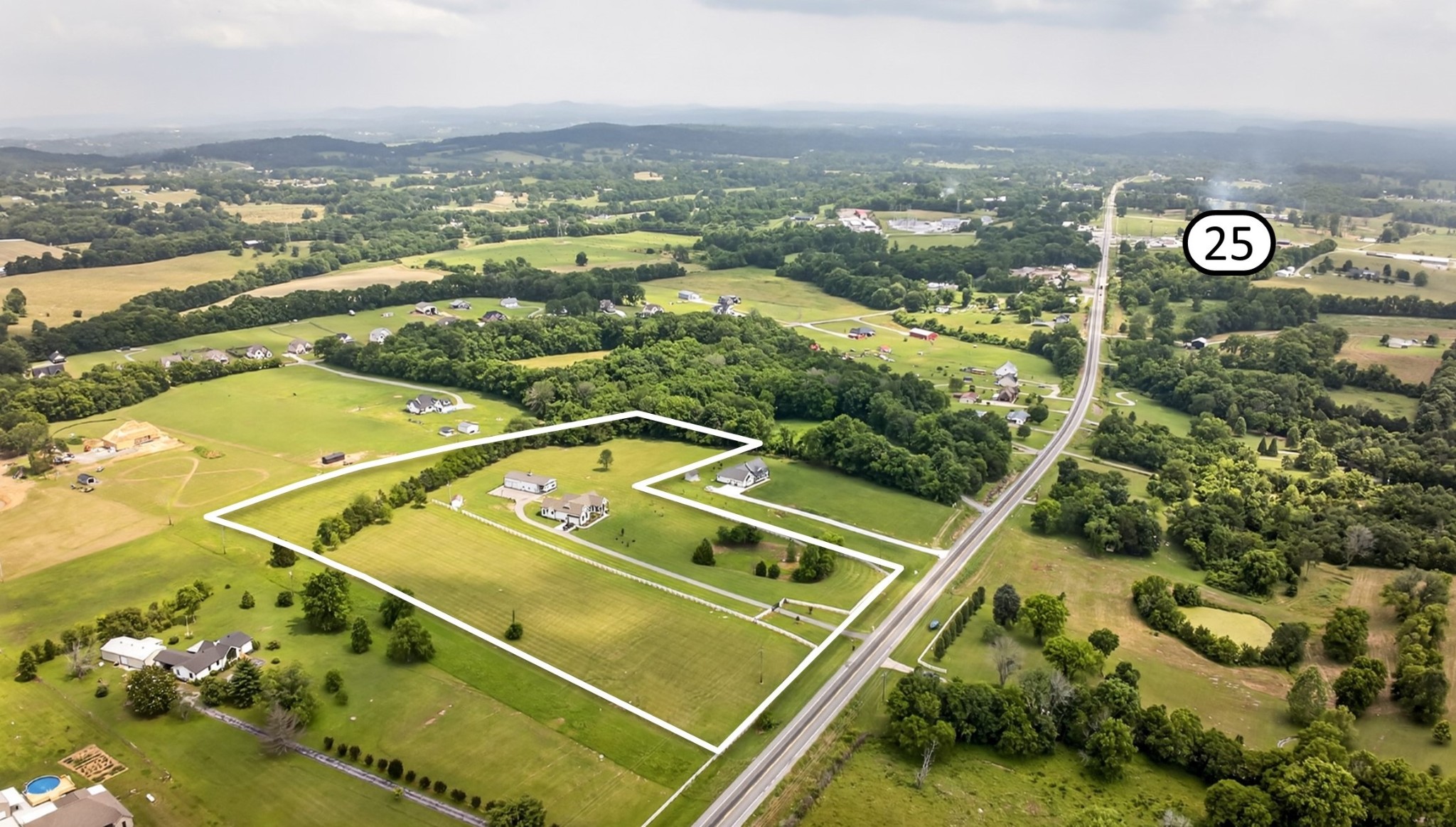 7040 Highway 231 Bethpage, TN 37022 - Photo 81 of 83 an aerial view of a tennis court