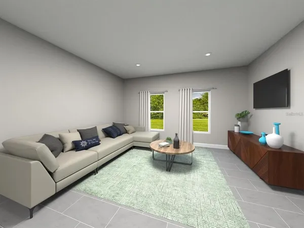 a living room with furniture and a large window