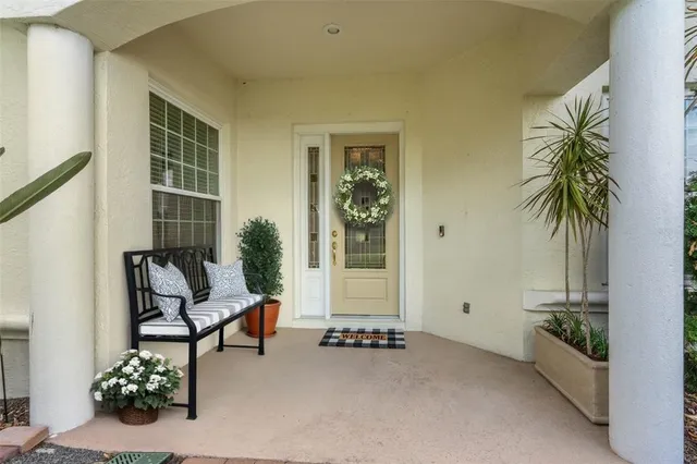 a view of livingroom with furniture wooden floor and windows