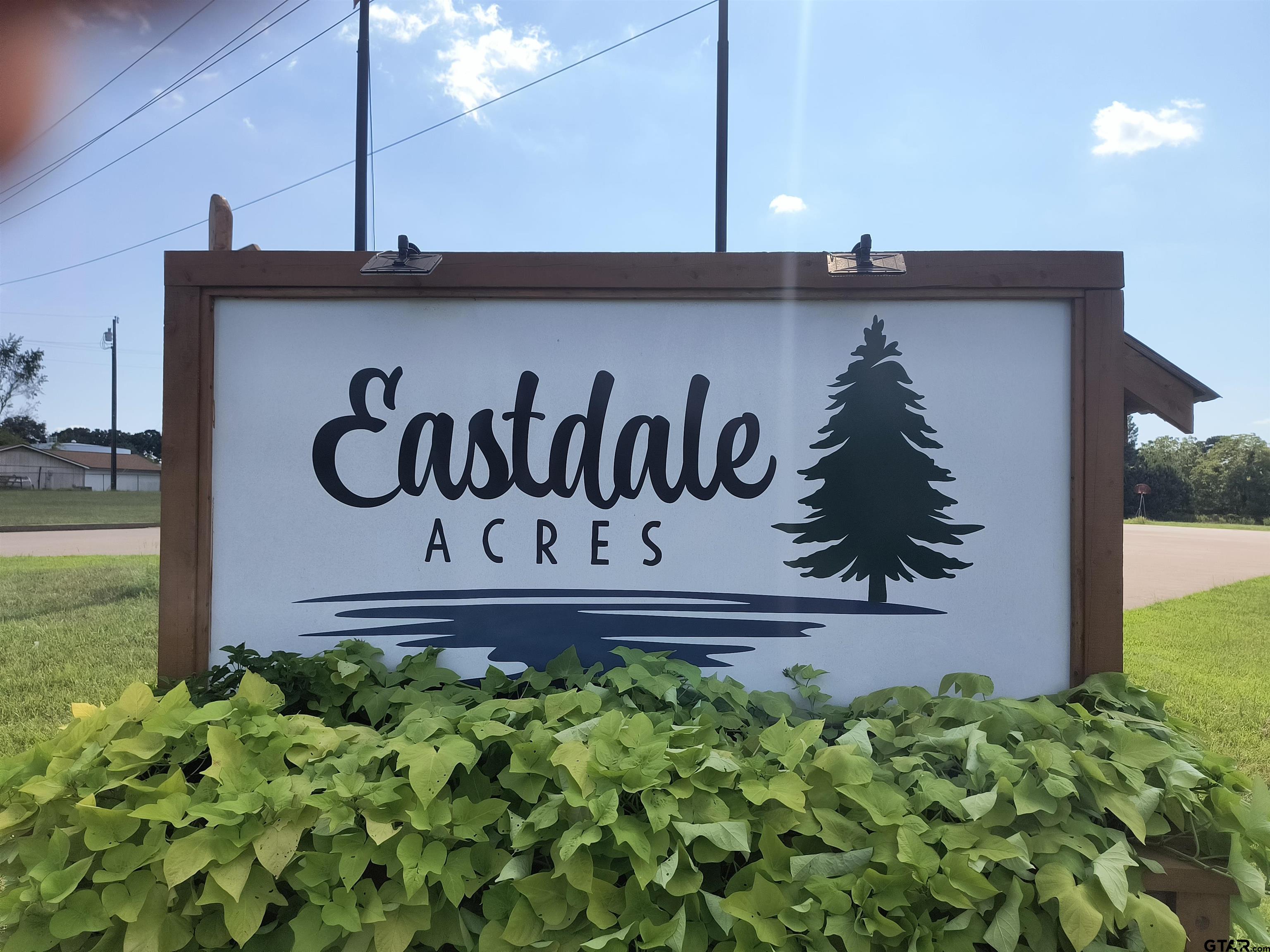 877 Caroline Bend Bullard, TX 75757 - Photo 18 of 19 a view of sign board with a small yard