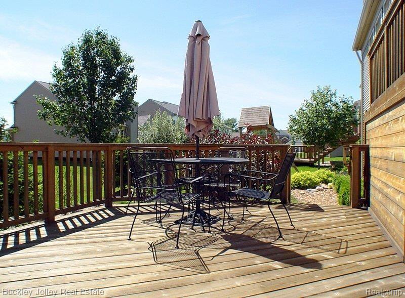 4269 Merriman Loop Howell, MI 48843 - Photo 21 of 23 Comfortable Deck for Entertainin