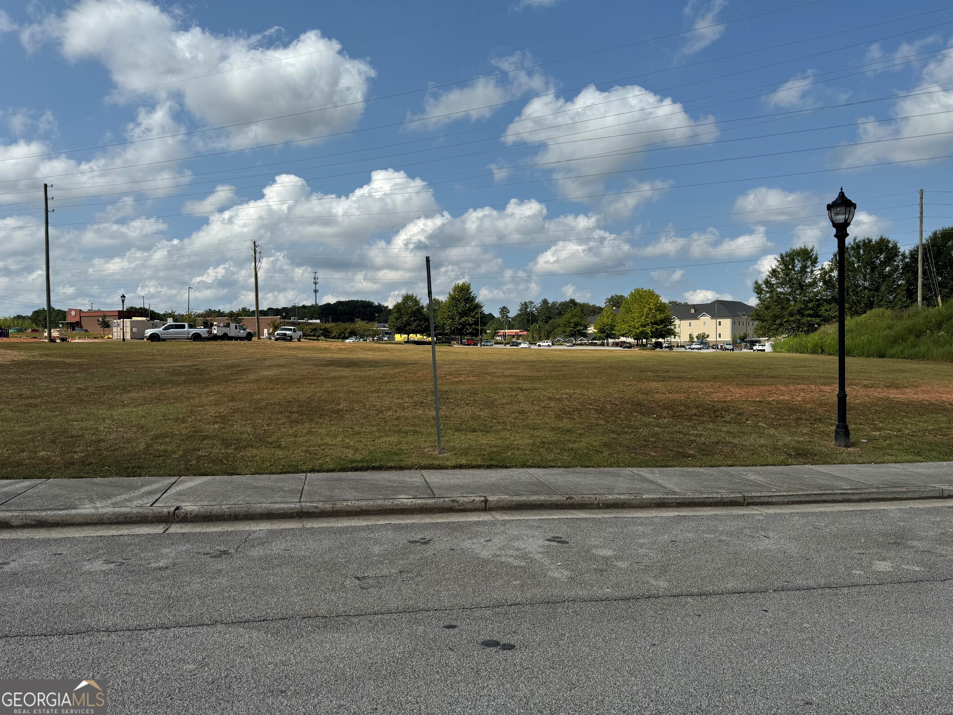 130 Maple Crossing, Unit LOT 2 Carrollton, GA 30117 - Photo 2 of 5 a view of a lake