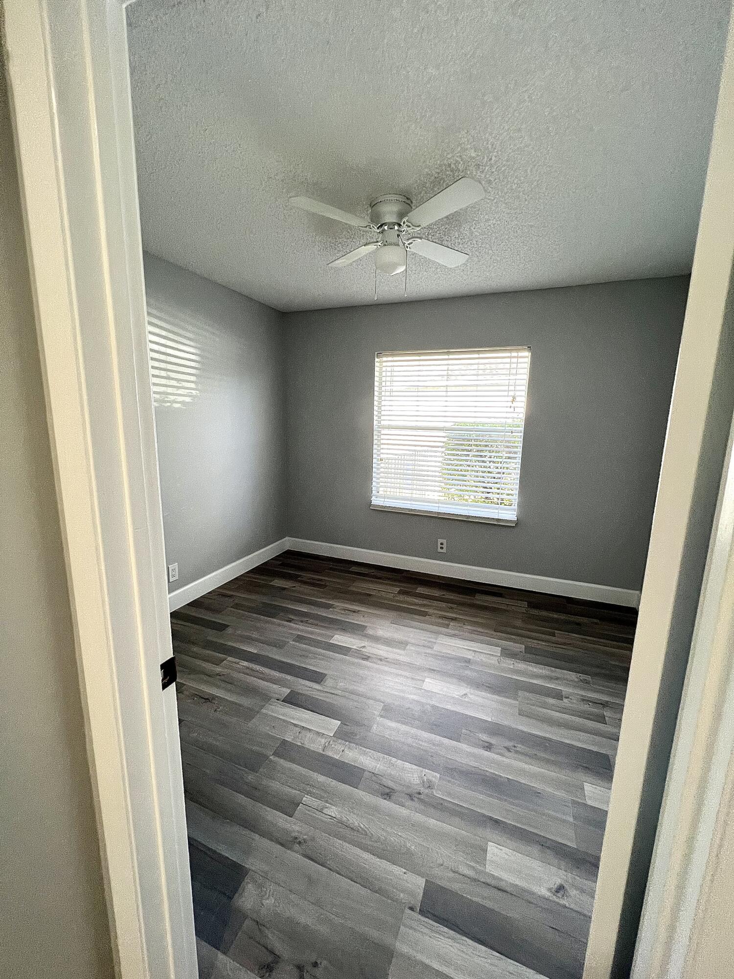 18859 La Costa Lane Boca Raton, FL 33496 - Photo 11 of 16 a view of an empty room and window