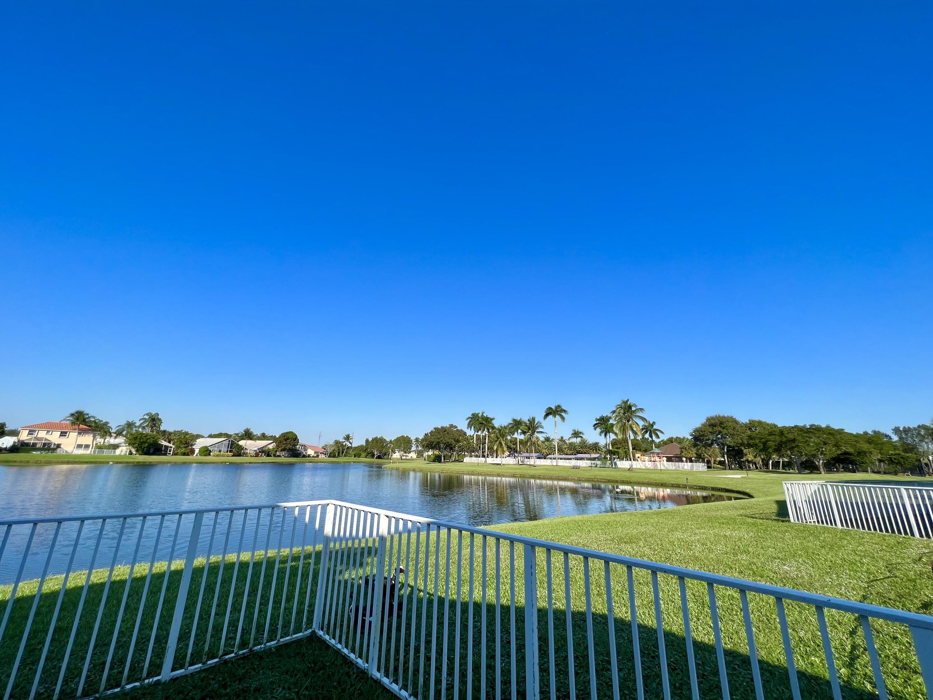 18859 La Costa Lane Boca Raton, FL 33496 - Photo 3 of 16 a view of a balcony with two chairs