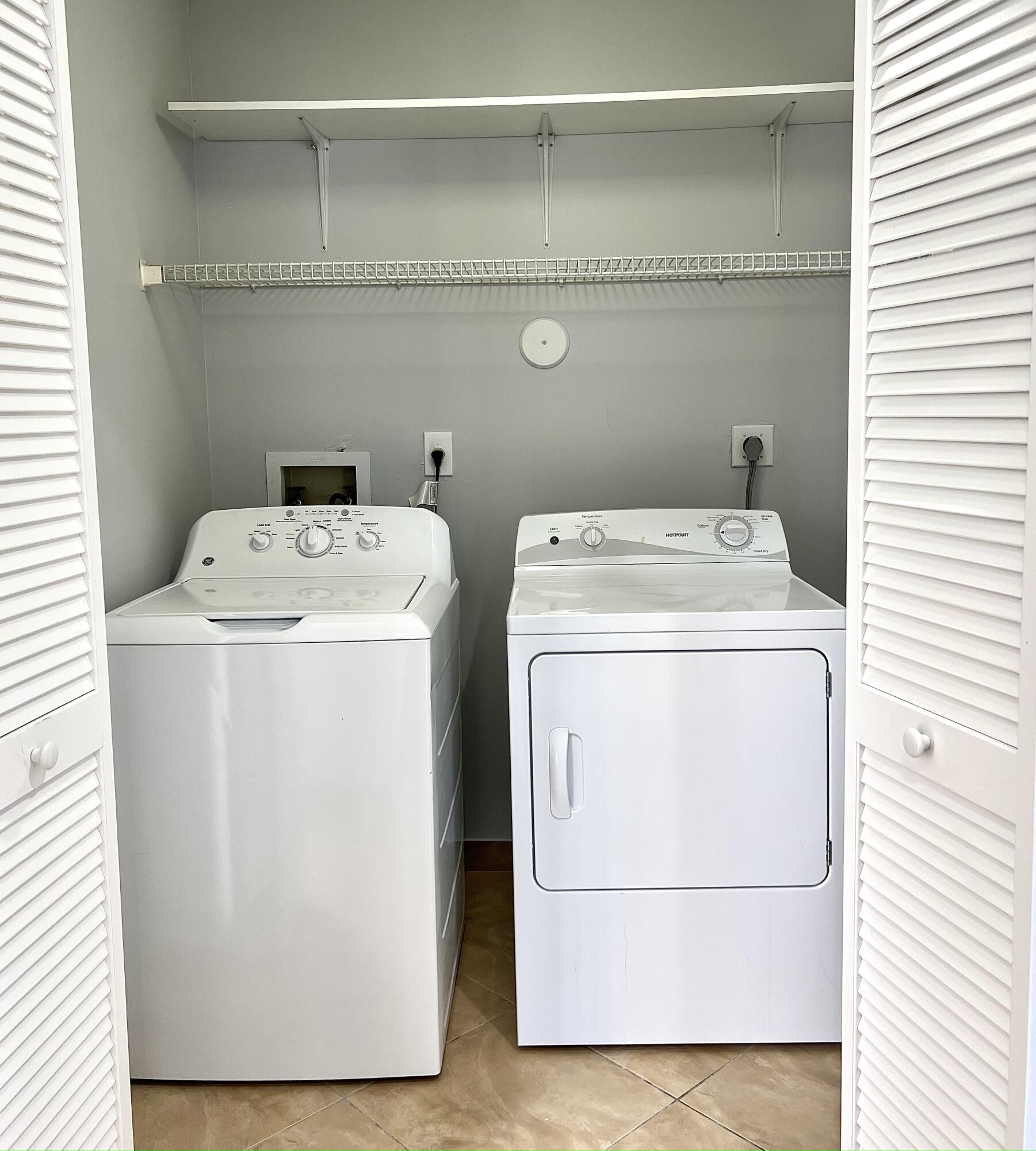 18859 La Costa Lane Boca Raton, FL 33496 - Photo 9 of 16 a utility room with dryer and washer