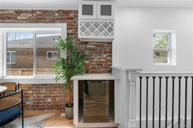 a view of front door of house with stairs