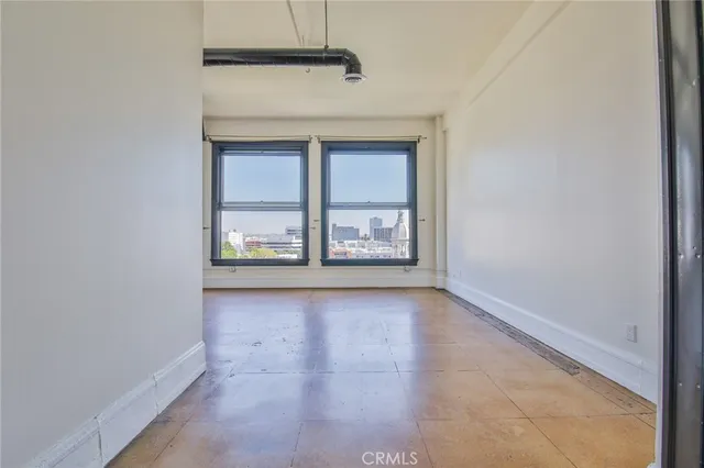 a view of a hallway with a chandelier