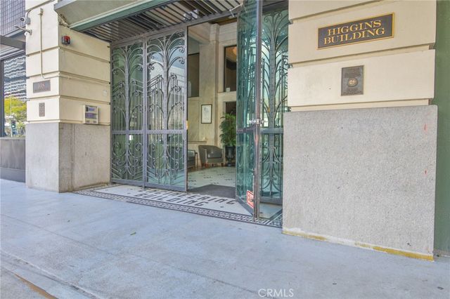 a view of a house with a street