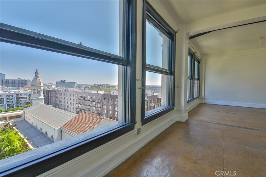 108 West 2nd Street, Unit 803 Los Angeles, CA 90012 - Photo 7 of 28 a view of a living room and balcony