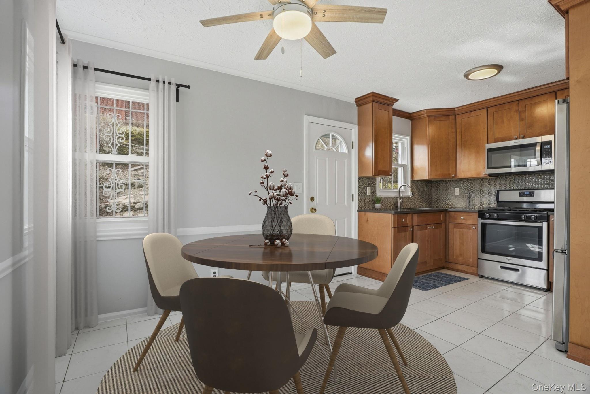 71 Glen Road Yonkers, NY 10704 - Photo 7 of 30 a dining room with furniture and window