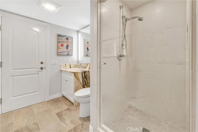 a view of a balcony with wooden floor and outdoor space