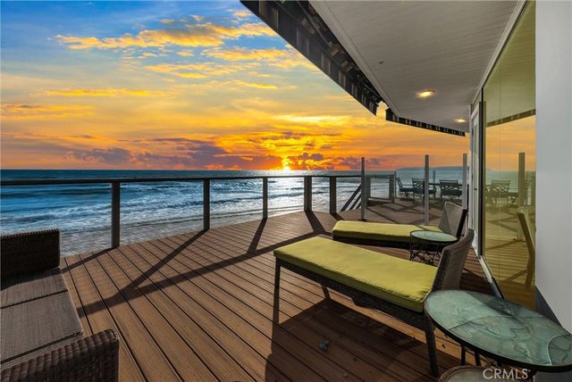 a view of sitting area with furniture and wooden floor