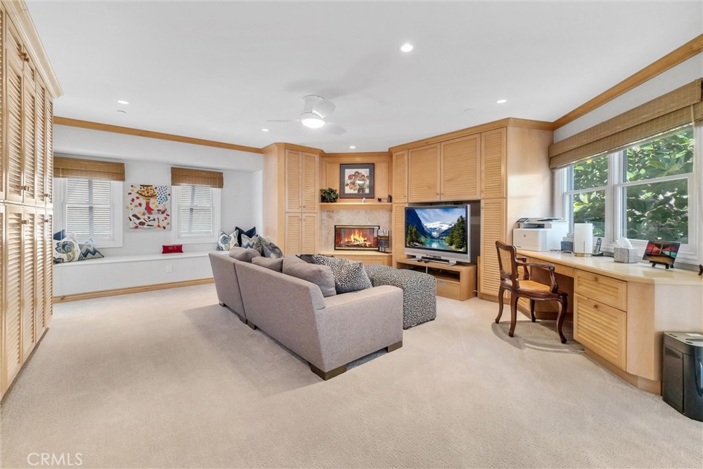 35781 Beach Road Dana Point, CA 92624 - Photo 24 of 58 a living room with furniture and a fireplace