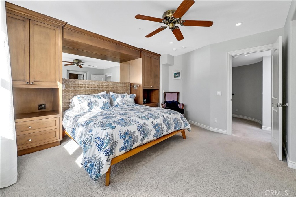 35781 Beach Road Dana Point, CA 92624 - Photo 31 of 58 a bedroom with a bed and a walk in closet