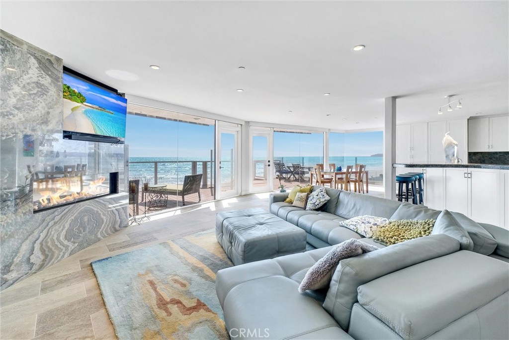 35781 Beach Road Dana Point, CA 92624 - Photo 9 of 58 a living room with furniture and a large window
