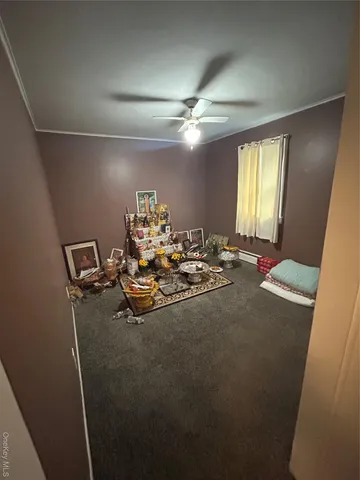 a view of a workspace with furniture