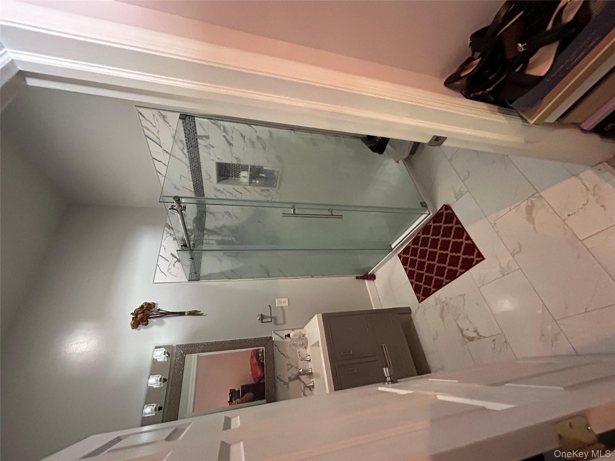 16 Joseph Road Holmes, NY 12531 - Photo 12 of 21 a bathroom with a sink a toilet a mirror and shower