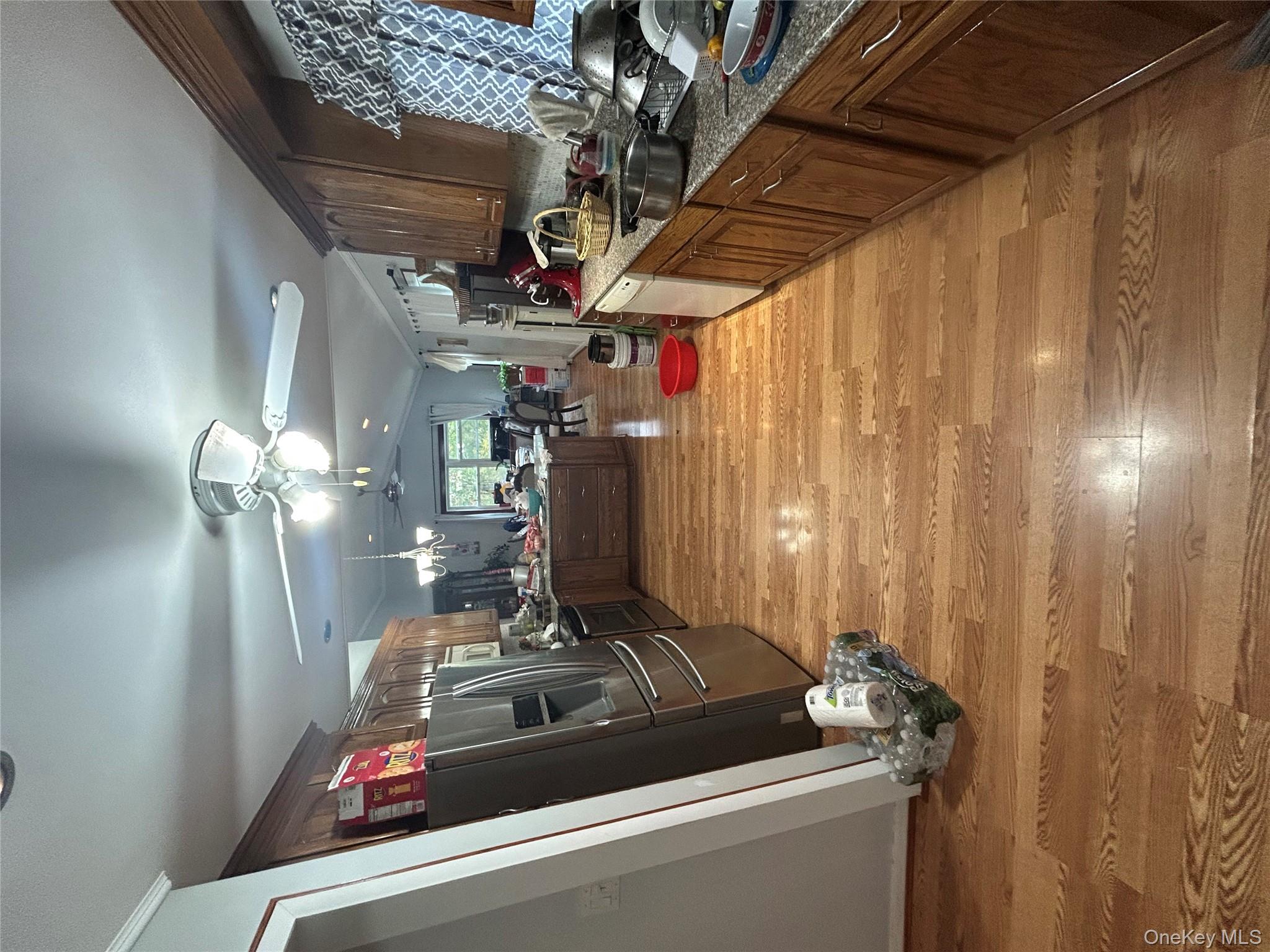 16 Joseph Road Holmes, NY 12531 - Photo 14 of 21 a view of a kitchen with kitchen island a counter top space a sink stainless steel appliances and cabinets