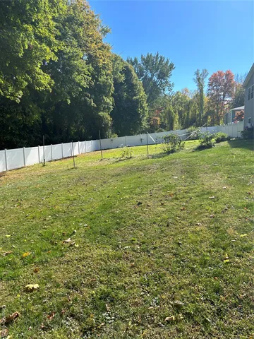 a kitchen with sink cabinets and window