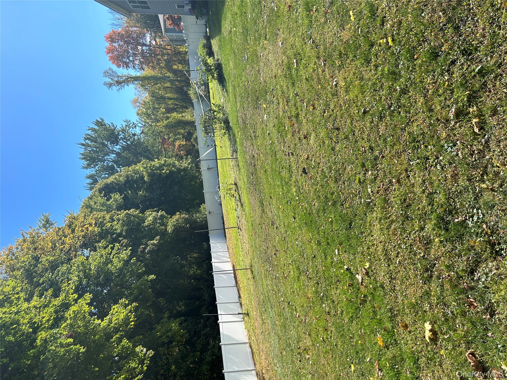 16 Joseph Road Holmes, NY 12531 - Photo 18 of 21 a view of yard with swimming pool and trees