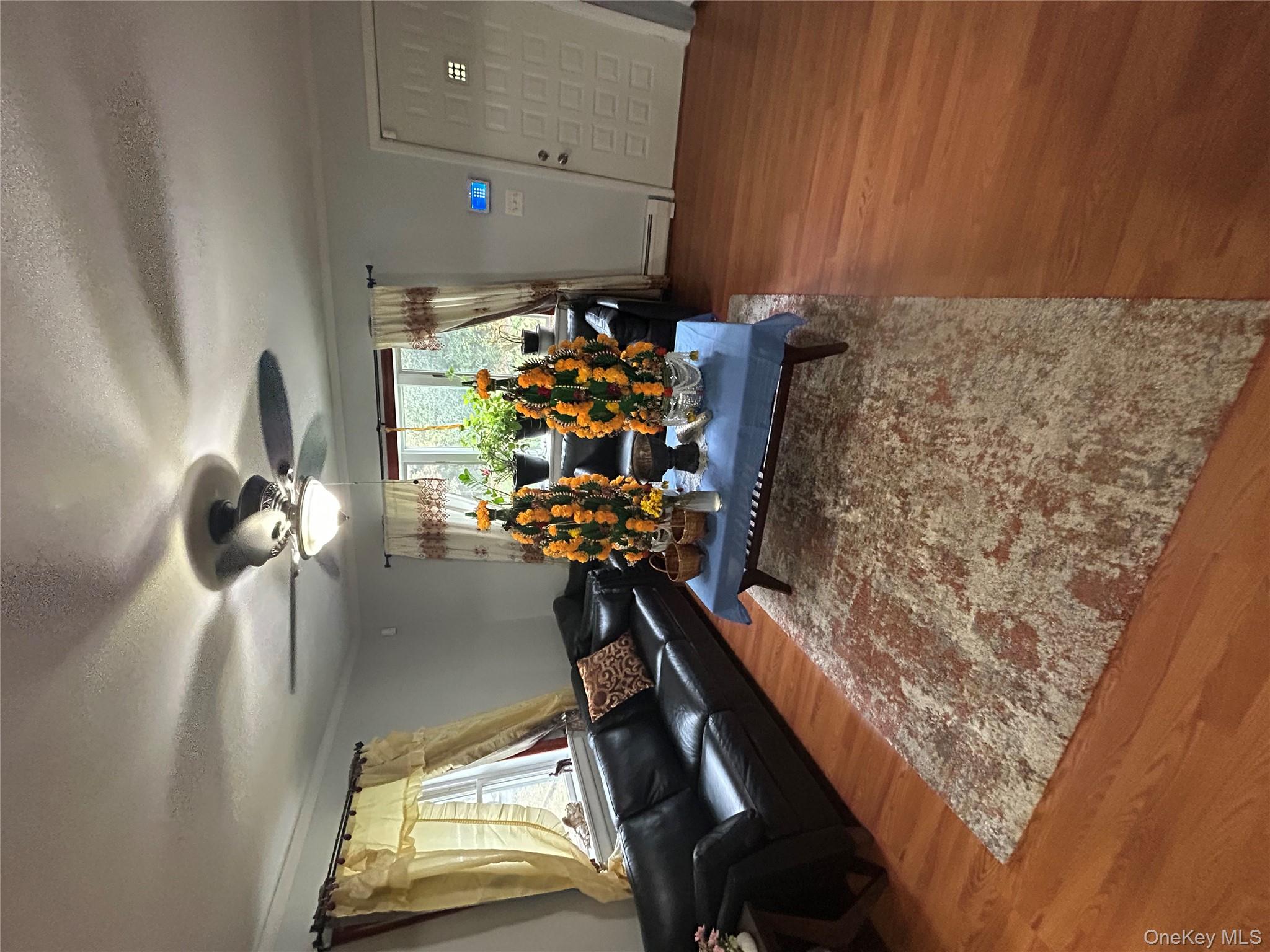 16 Joseph Road Holmes, NY 12531 - Photo 6 of 21 a living room with furniture and a large window