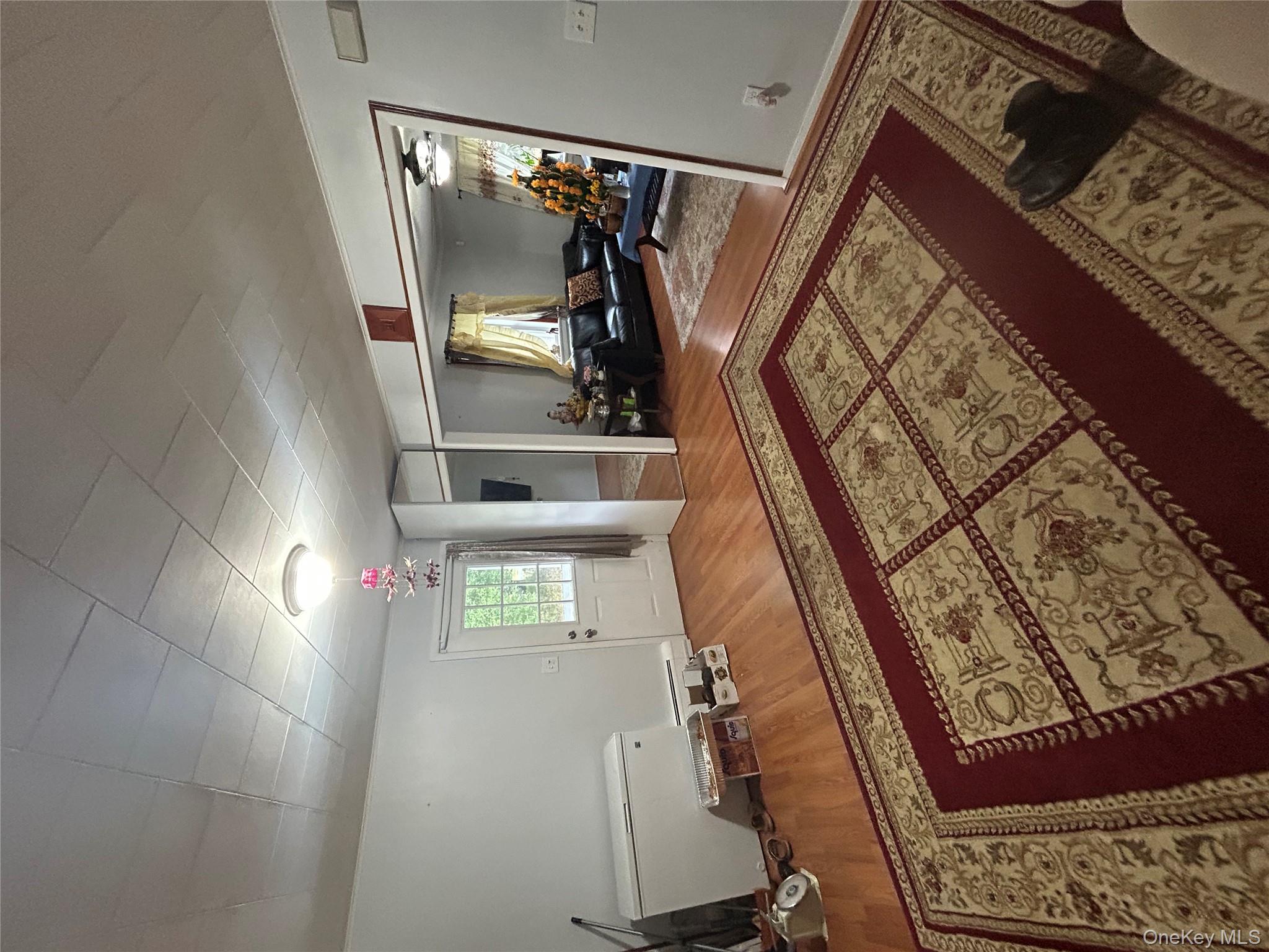 16 Joseph Road Holmes, NY 12531 - Photo 7 of 21 a living room with a rug and a couch