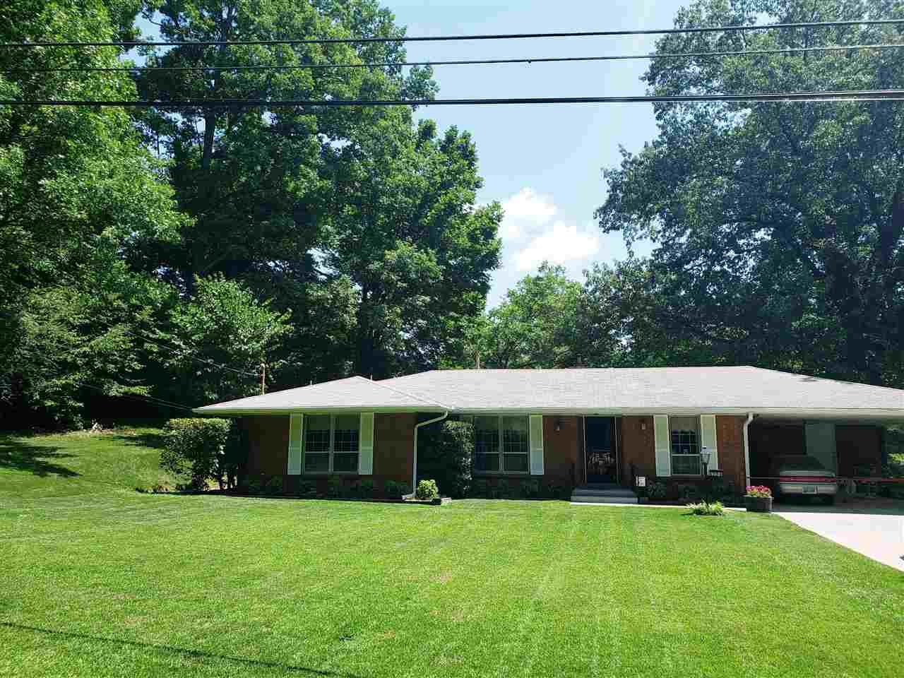 4764 Coro Road Memphis, TN 38109 - Photo 2 of 17 a view of a house with a garden