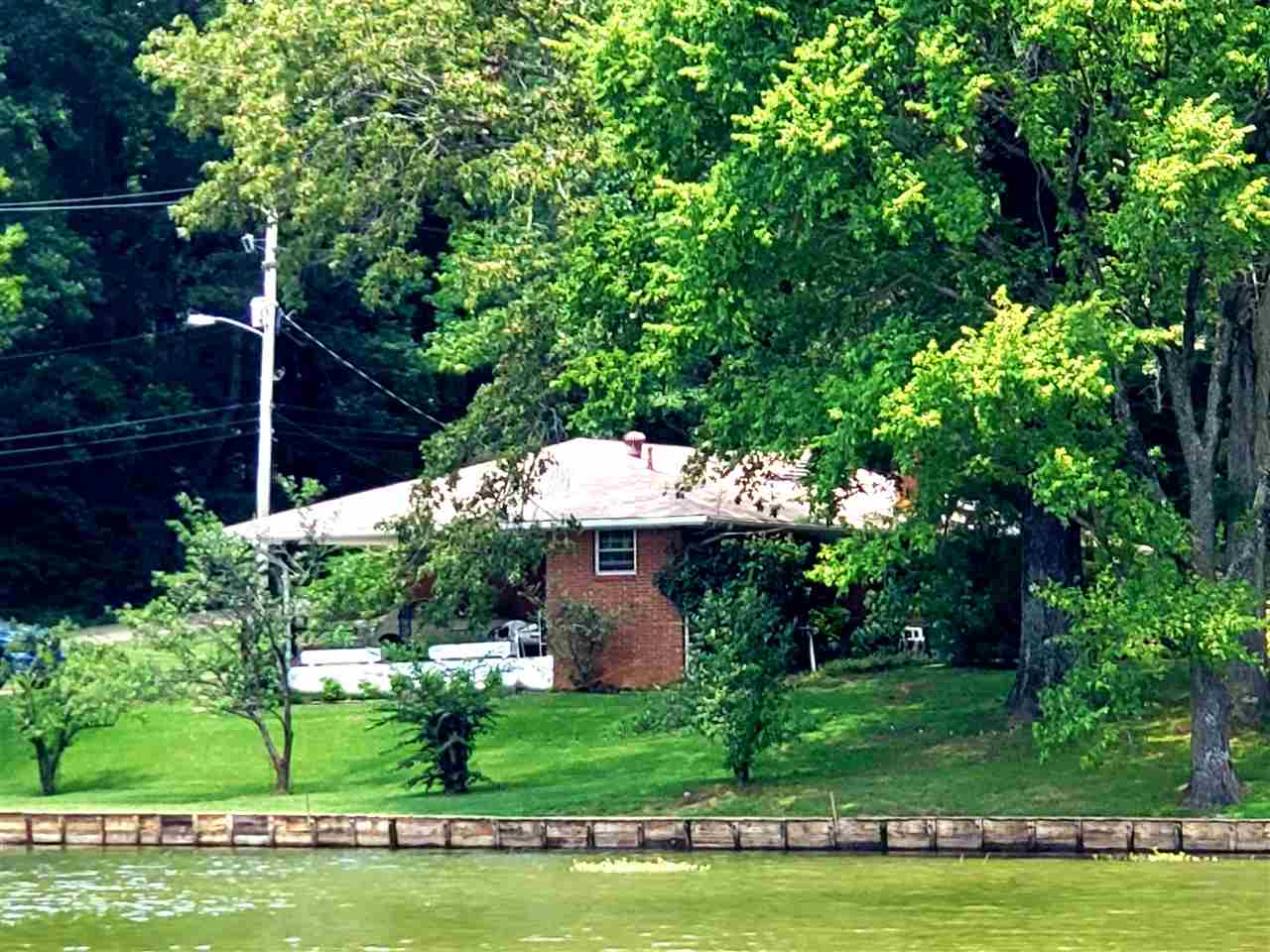 4764 Coro Road Memphis, TN 38109 - Photo 11 of 17 a front view of a house with a yard