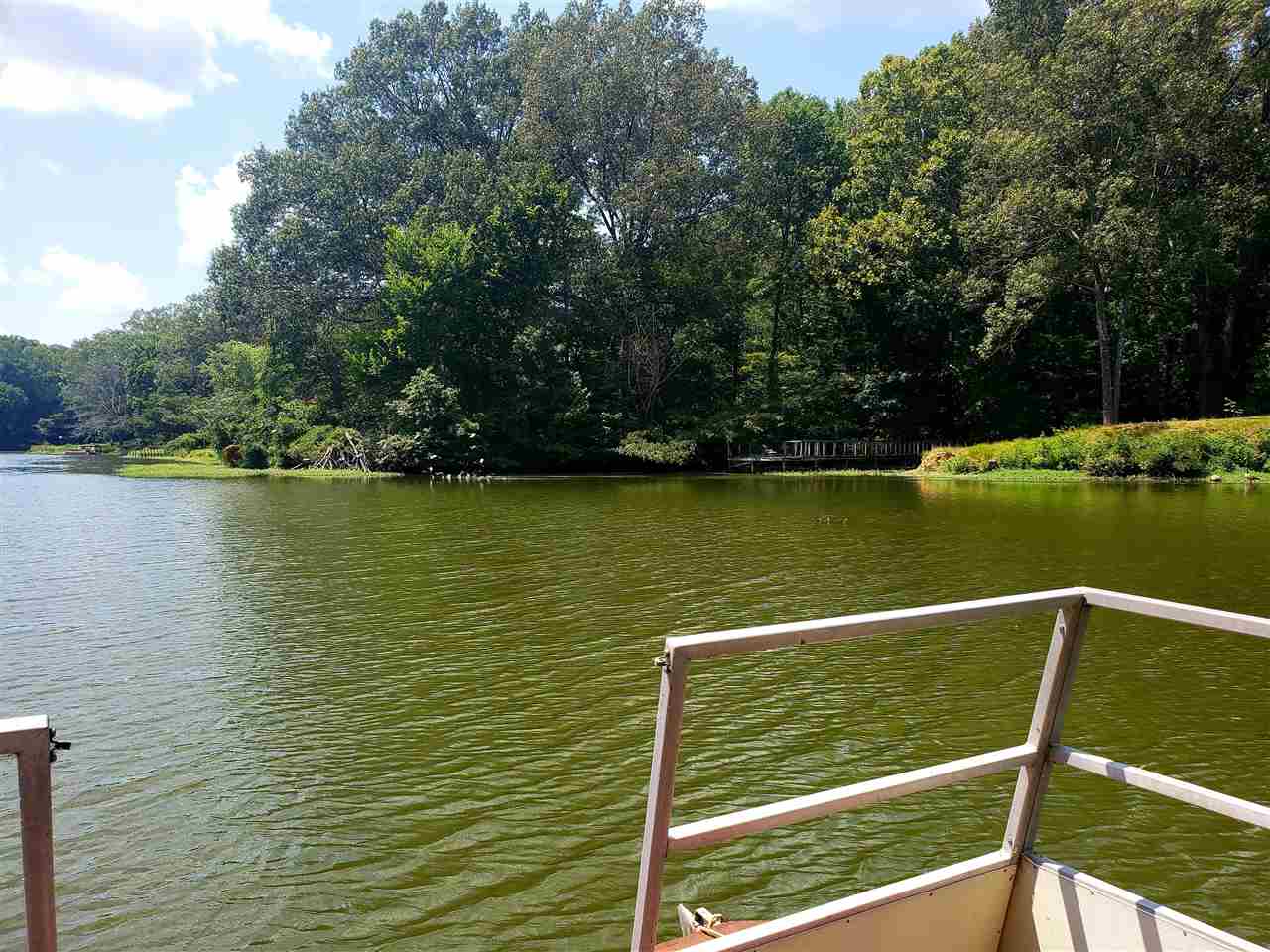 4764 Coro Road Memphis, TN 38109 - Photo 15 of 17 a view of a lake from a balcony