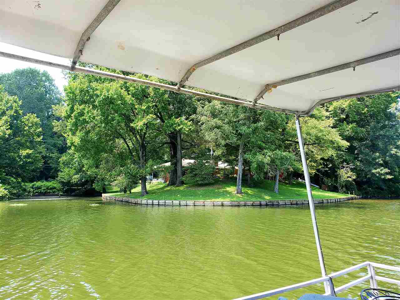 4764 Coro Road Memphis, TN 38109 - Photo 17 of 17 a view of a swimming pool with a patio