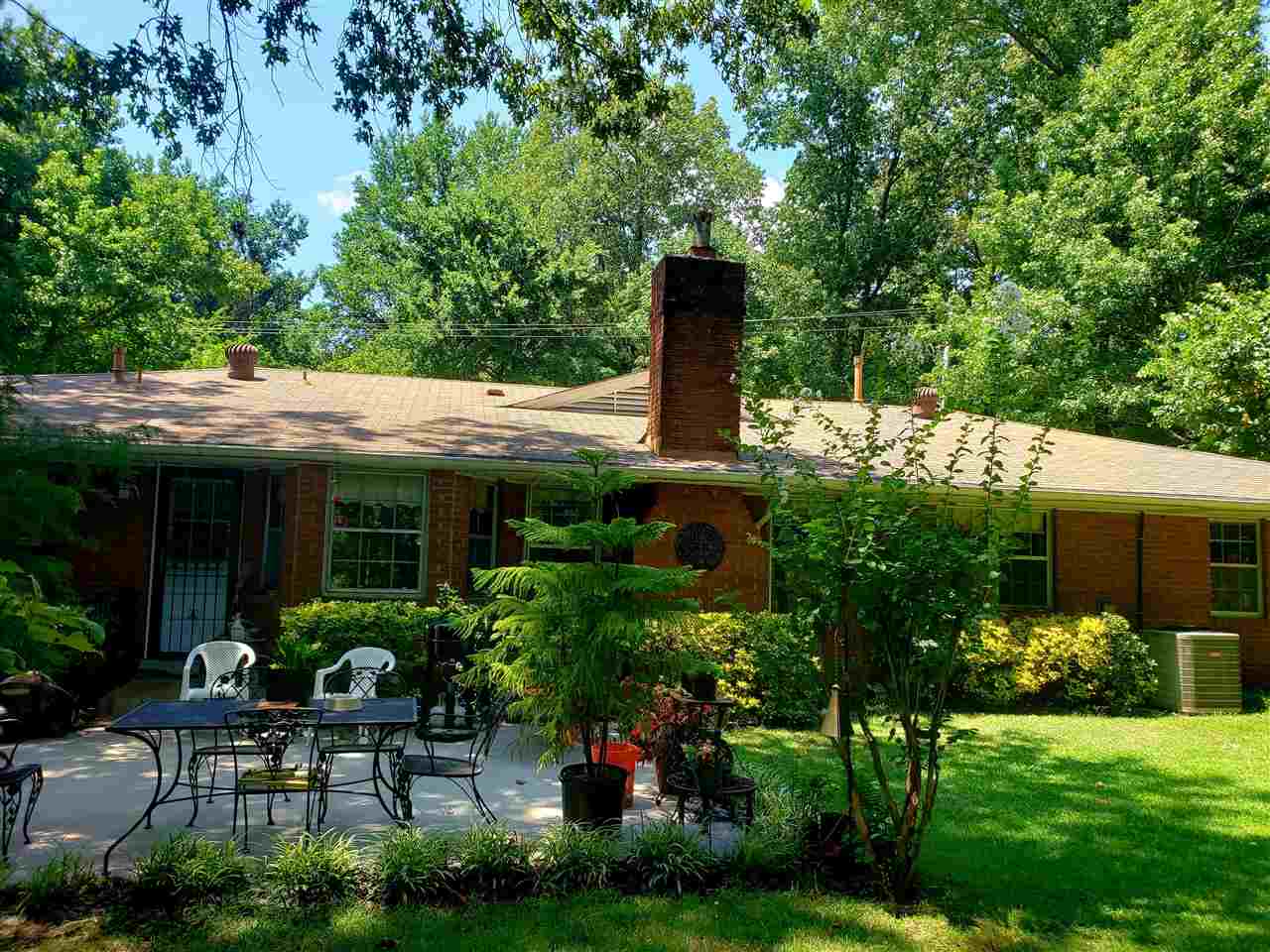 4764 Coro Road Memphis, TN 38109 - Photo 6 of 17 a view of backyard with outdoor seating and green space
